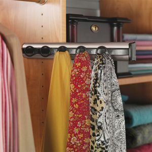 Scarf rack in closet holding scarves