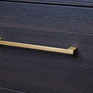 Modern handle on dark drawer